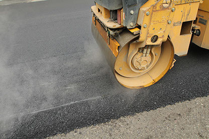 Asphalt paving and rolling